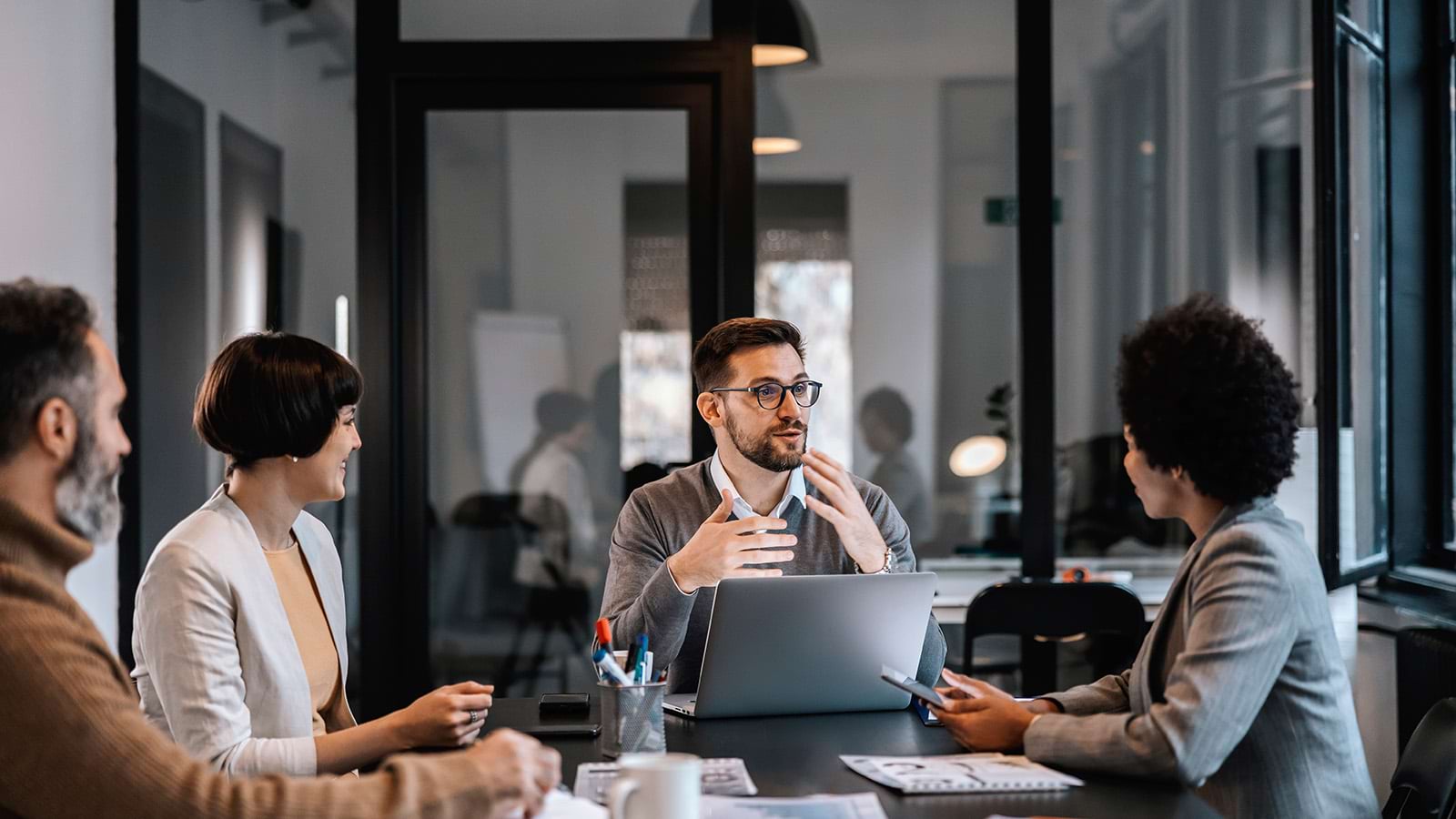 Colleagues discussing in a meeting
